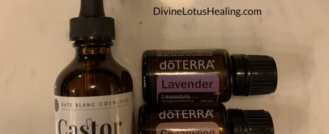 A set of essential oils with a castor oil bottle and a bonus recipe for eyelash growth serum.
